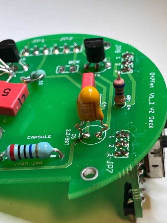 D-47FET Top PCB close-up showing tantalum capacitors installed with + leads aligned to silkscreen + pads.
