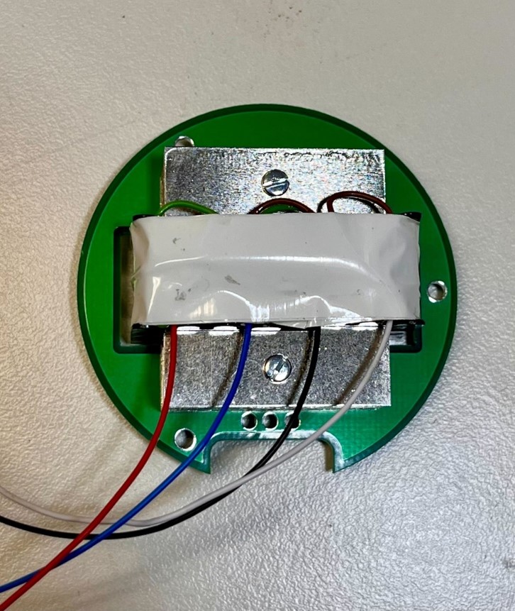 D-47FET Bottom PCB with audio transformer mounted using screws, lock washers, and nylon washers — red, black, blue, and white transformer wires visible.
