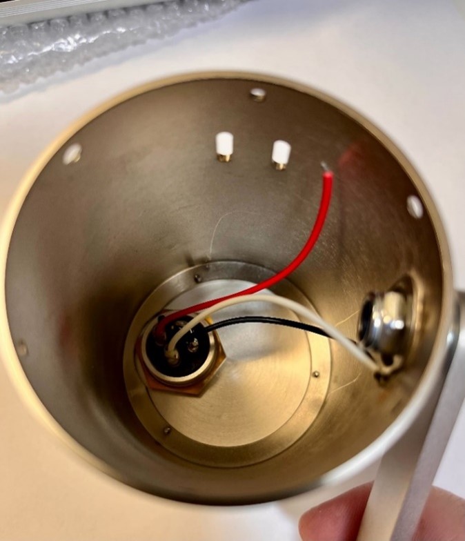 D-U47FET body interior showing the XLR connector with red and black wires threaded through the bottom of the body.