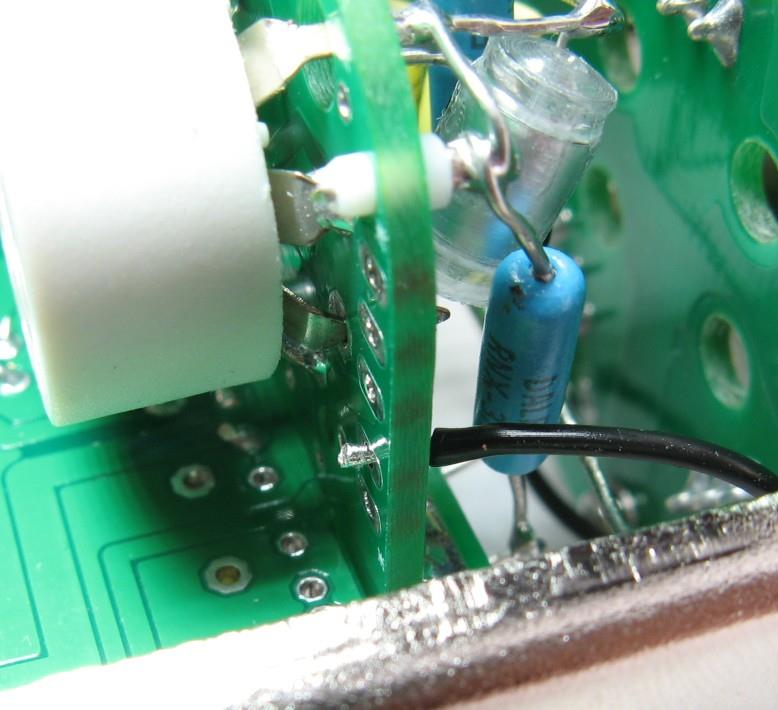 Pad wire being fed through guide