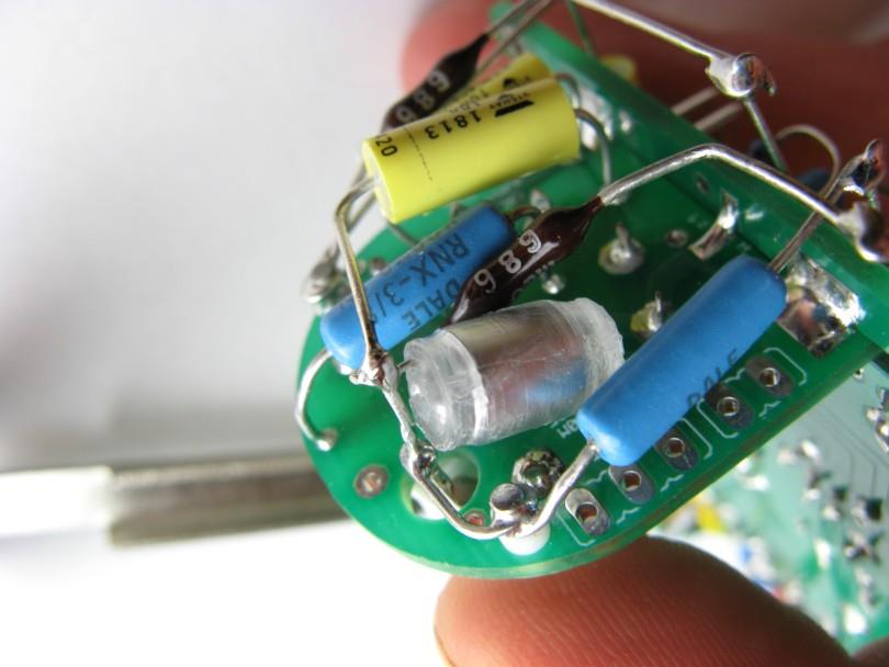 C10 270 pF polystyrene capacitor being installed