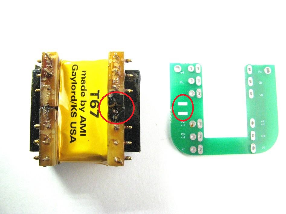 Transformer PCB installation with two red-marked critical points