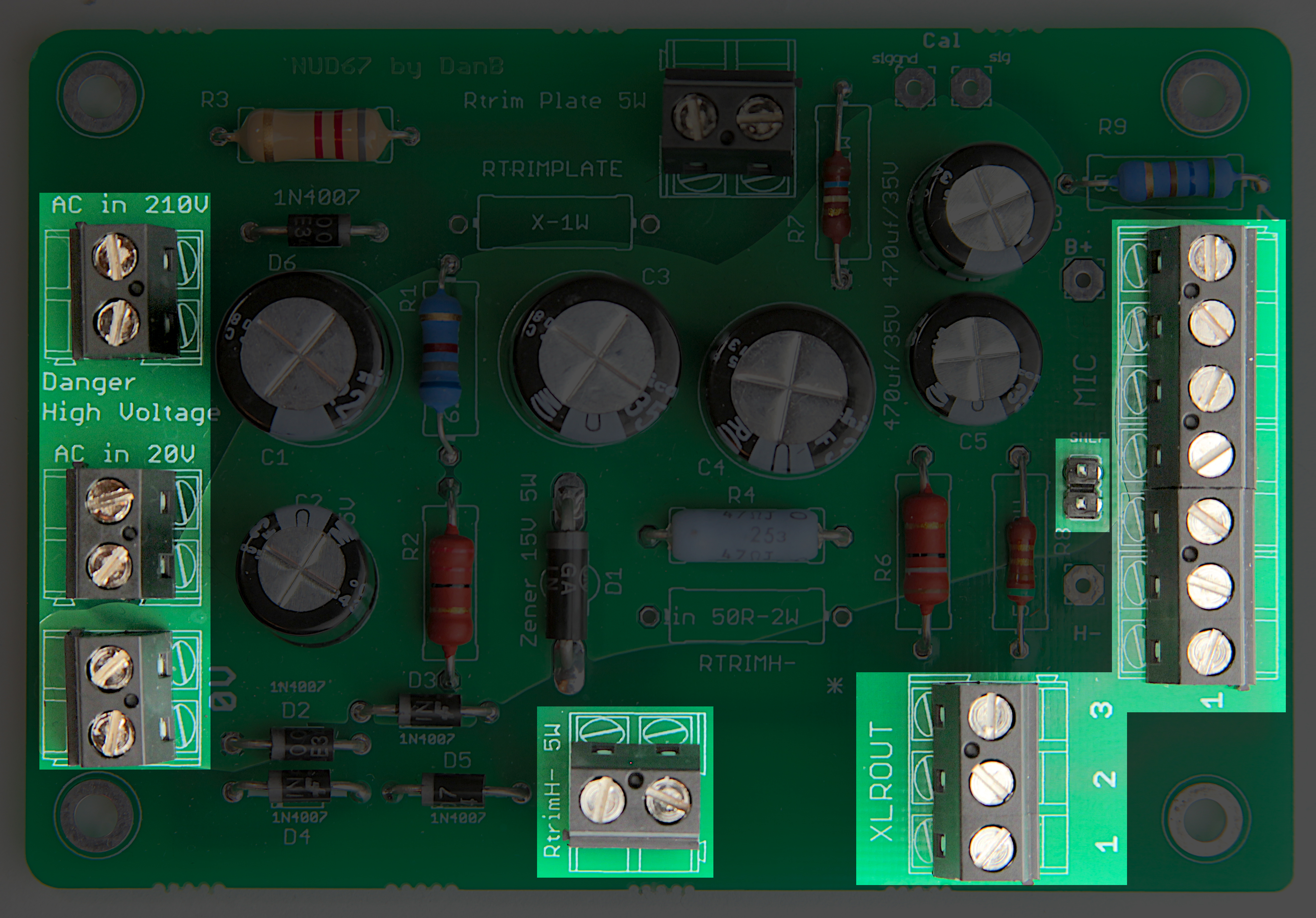 Headers and wire terminals being installed on PSU PCB