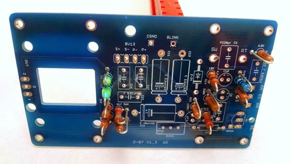D-87 PCB with resistors and Zener diode installed, leads trimmed flush.