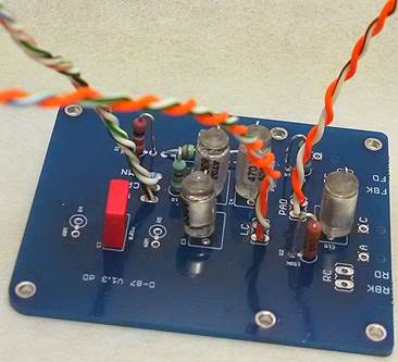 D-87 PCB inter-board wiring detail — wire routing and connection points between main board and switch board.