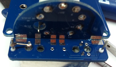 Top view of the tube socket PCB showing SMD component pads being populated