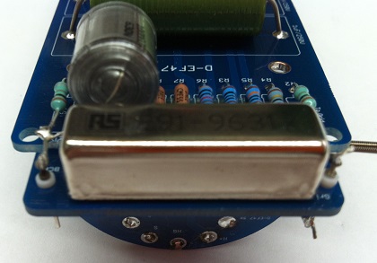 Front view of PCB assembly showing relay, Styroflex, resistors, and output capacitors all installed