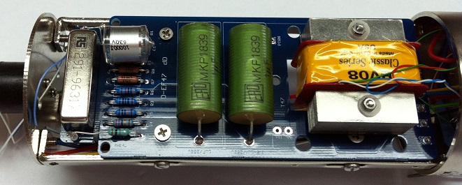 Top view of mic body showing full assembly: relay, Styroflex, resistors, two MKP output caps, and BV08 transformer